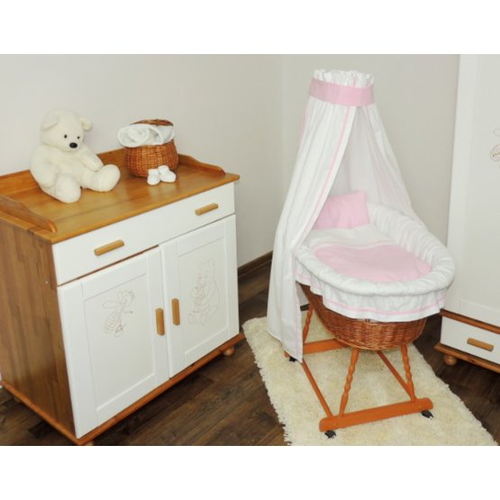 Wicker basket for baby with pink set bedding