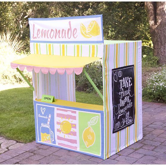 Children playing house Stand with lemonade
