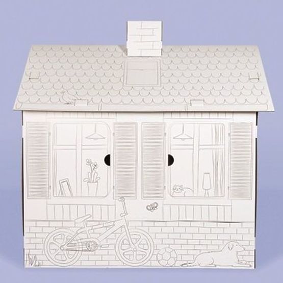 Children's cardboard house with a chimney