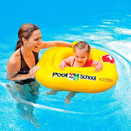 Inflatable swimming seat