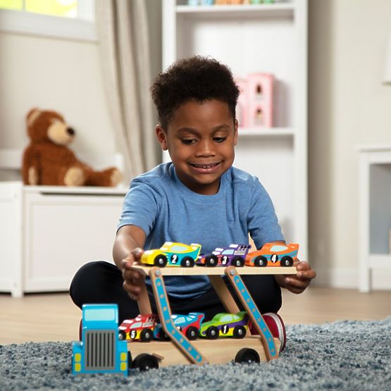 Large Truck with Racing Cars