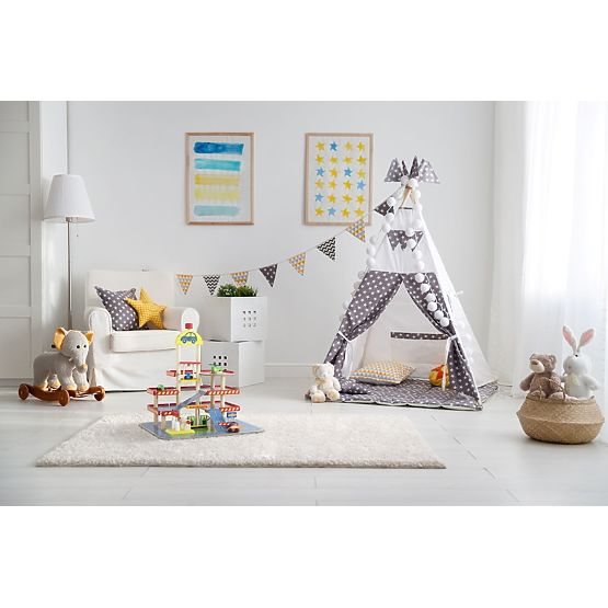 Tomi's wooden garage with lift, toy cars and helicopter