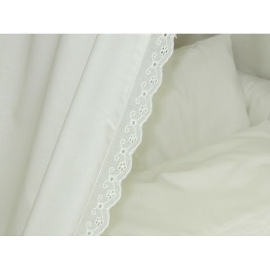 Wicker basket for baby with lace set bedding