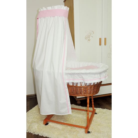 Wicker basket for baby with pink set bedding