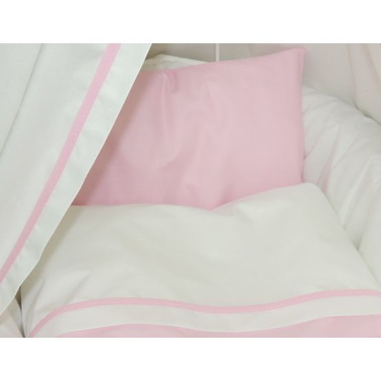 Wicker basket for baby with pink set bedding