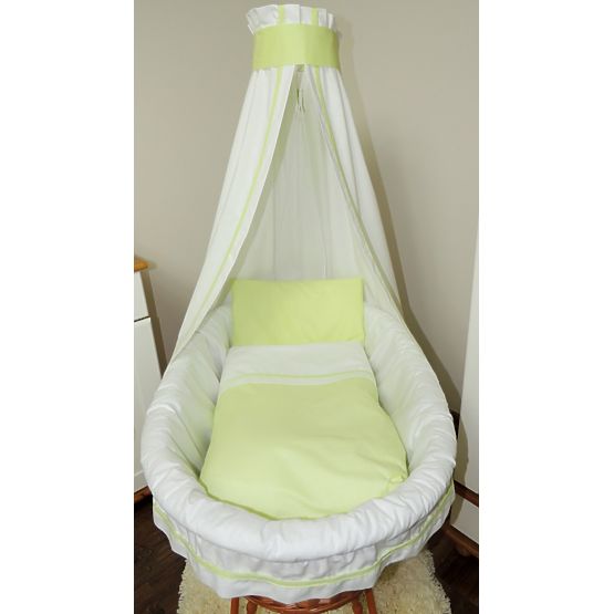 Wicker basket to baby with green set bedding