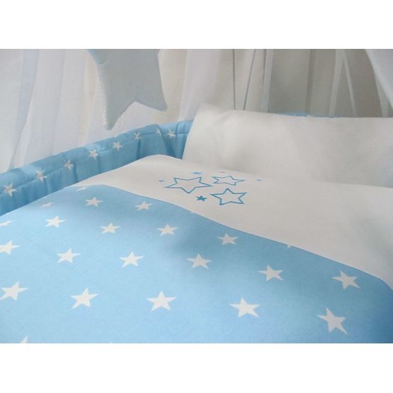 Wicker cot with equipment for baby - blue stars
