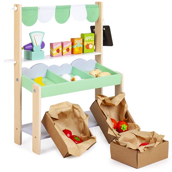 Wooden sales stand with vegetables