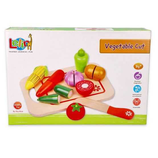 Wooden vegetables with a cutting board