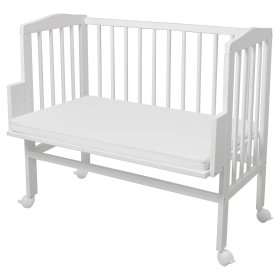 Cot for Amy's parents' bed - white